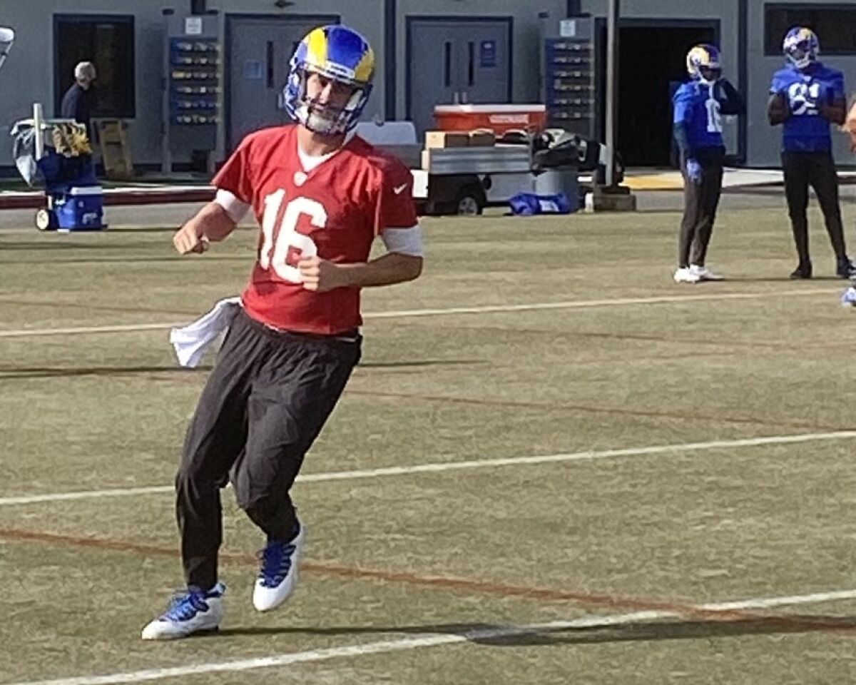 Jared Goff runs during Rams practice Thursday. 