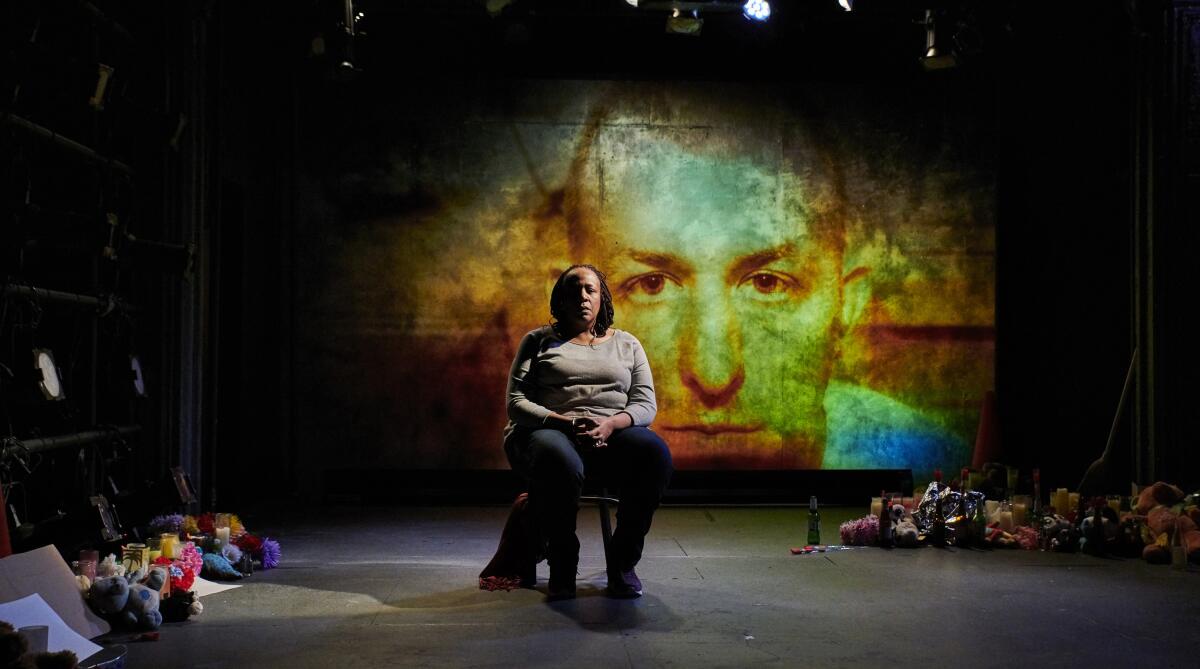 Dael Orlandersmith sits in a chair onstage in “Until the Flood,” to be streamed on Center Theatre Group's new Digital Stage