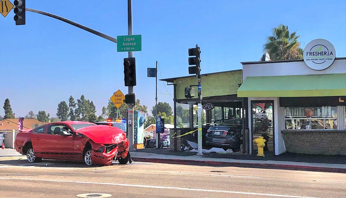 A red car outside Fresheria 