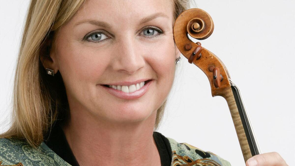 Concertmaster Margaret Batjer leads members of the Los Angeles Chamber Orchestra in a program of Mozart and Brahms at the Moss Theatre in Santa Monica.