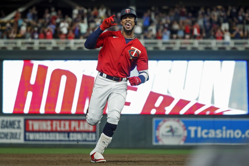 Minnesota Twins' Byron Buxton runs the bases on his two-run home run against the Baltimore Orioles during the ninth inning of a baseball game Friday, July 1, 2022, in Minneapolis. The Twins won 3-2. (AP Photo/Bruce Kluckhohn)