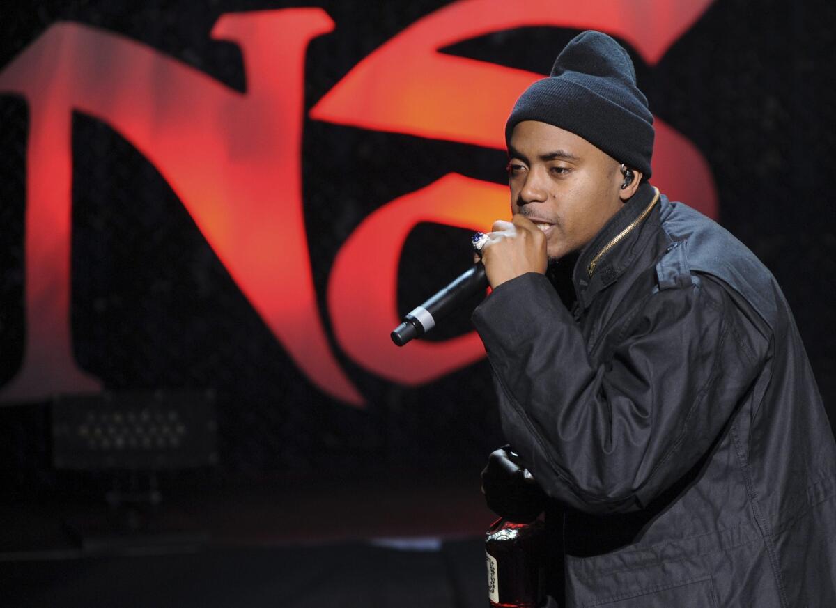 Nas performs at the "Time is Illmatic" premiere at the Tribeca Film Festival.