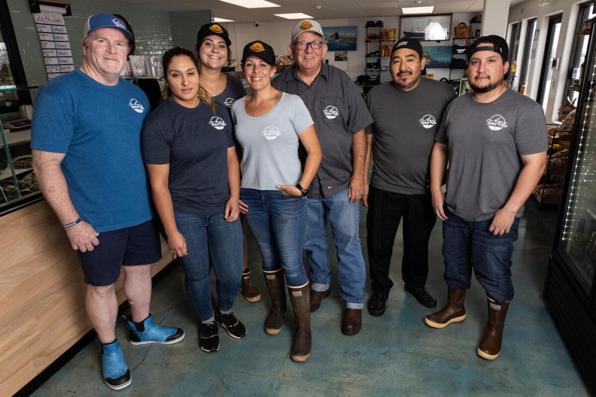 Tommy Gomes (third from right) with his crew at TunaVille Market and Grocery.