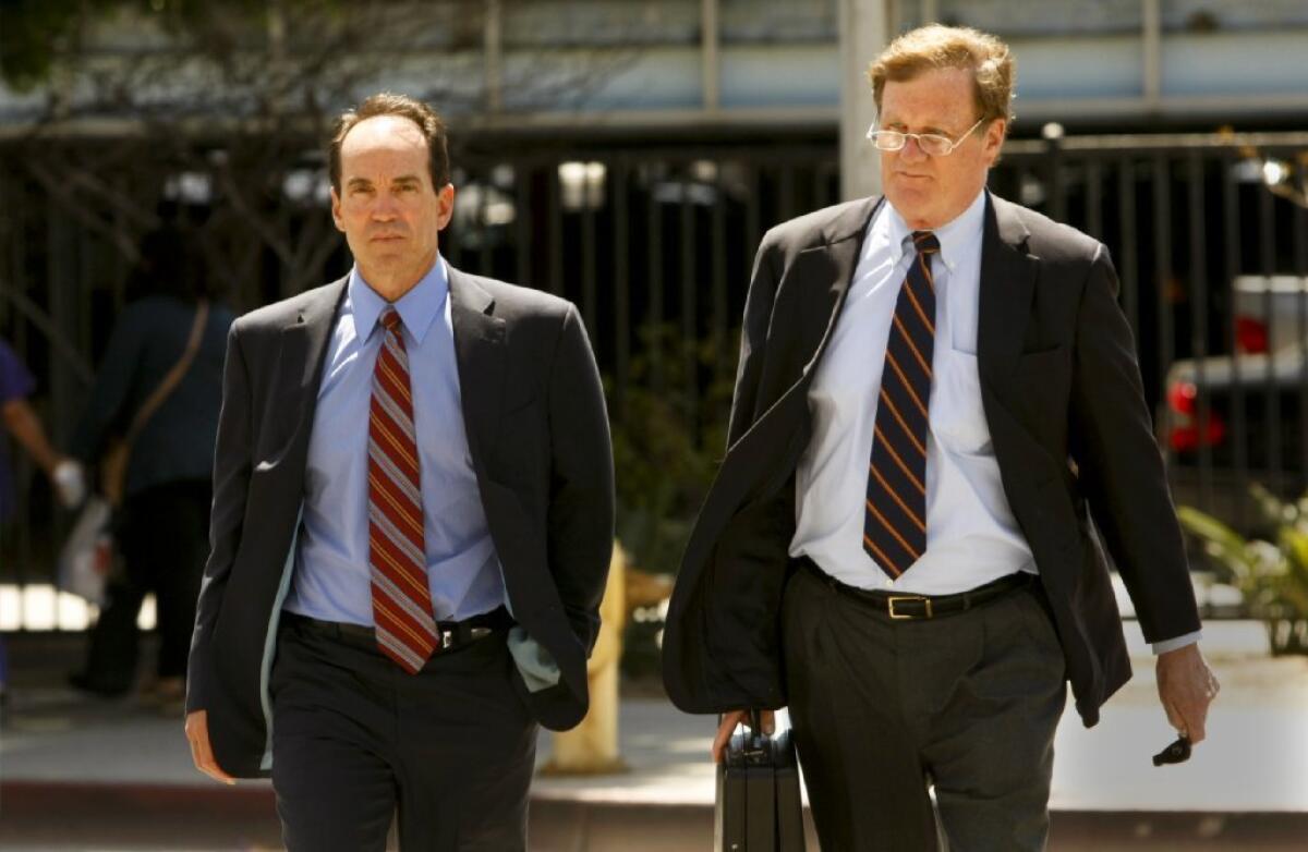Scott London, left, and his attorney, Harland Braun, outside the federal court in Los Angeles in April.
