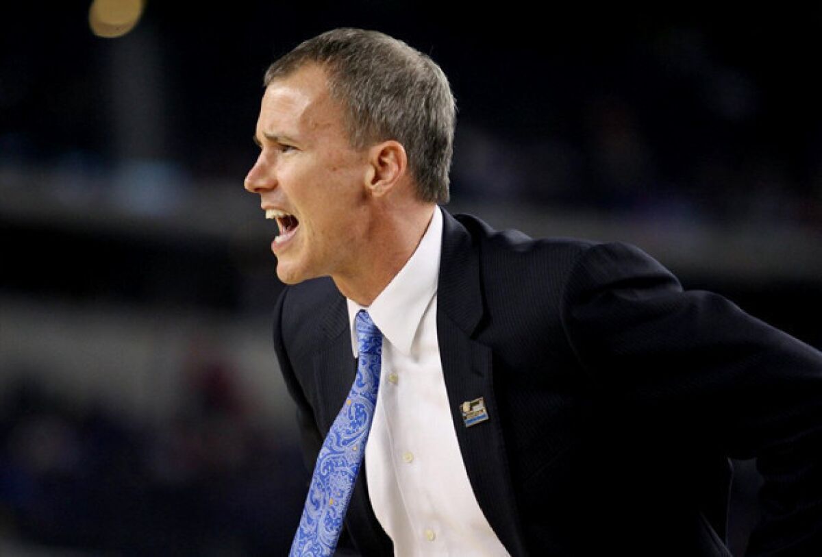Coach Andy Enfield works the sideline in the Sweet 16 game against Florida.