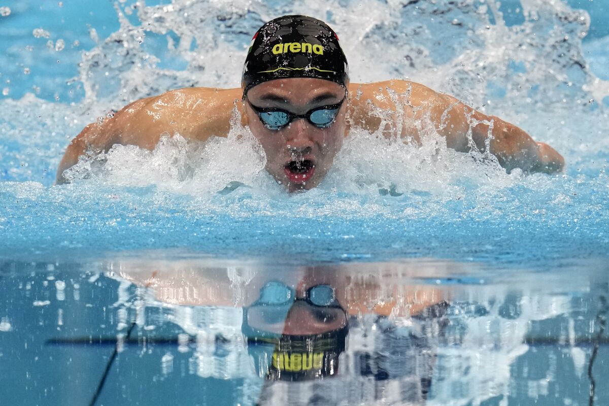 FILE - Kristof Milak, of Hungary, swims in a men's 100-meter butterfly semifinal at the 2020 Summer Olympics, July 30, 2021, in Tokyo, Japan. The world swimming championships start in Budapest on Saturday June 18, 2022. (AP Photo/Gregory Bull, File)