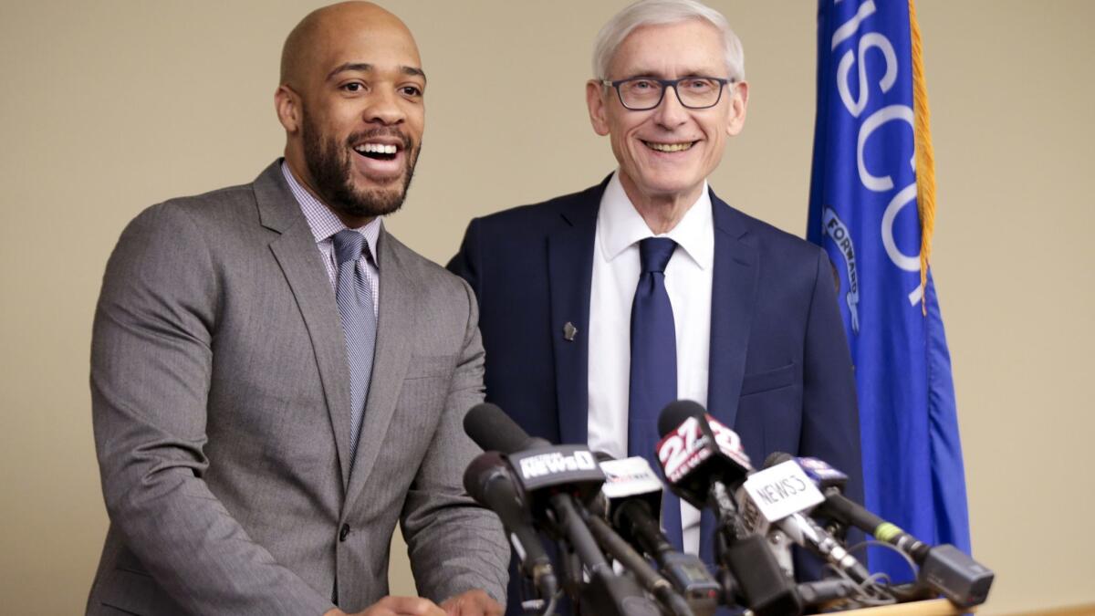 Mandela Barnes, left, and Tony Evers in January before they took office as Wisconsin's lieutenant governor and governor, respectively.