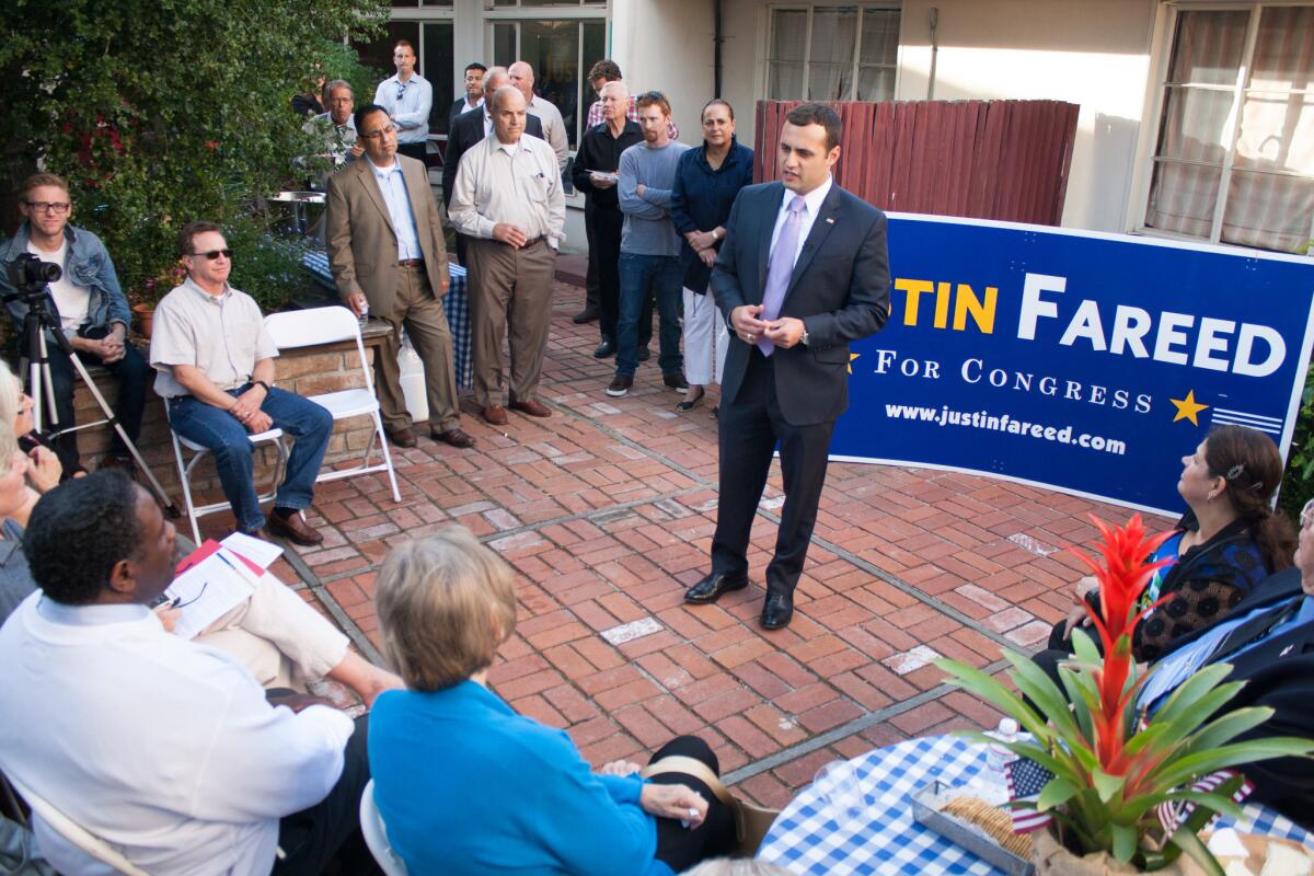 Republican businessman and congressional candidate Justin Fareed speaks to supporters at the opening of his campaign headquarters. He trailed Democrat Salud Carbajal with less than 30 percent of precincts reporting.