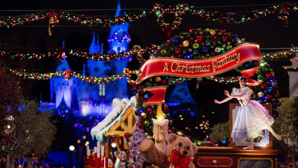 A Christmas parade is seen on Disneyland's Main Street.