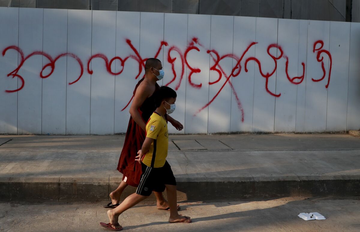 Graffiti says "Don't want dictatorship" in Yangon, Myanmar