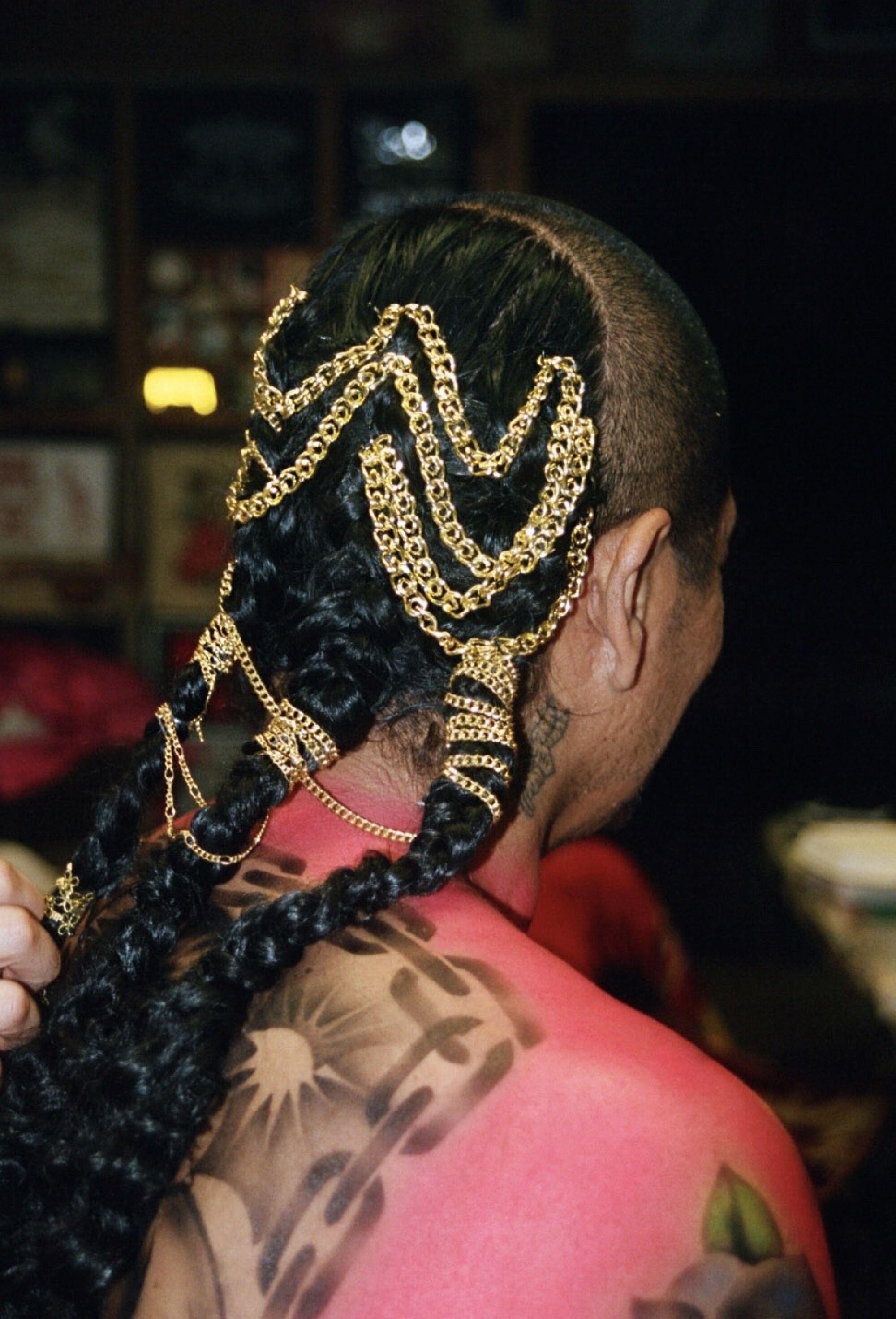 rafa esparza with a bejeweled braided hairstyle