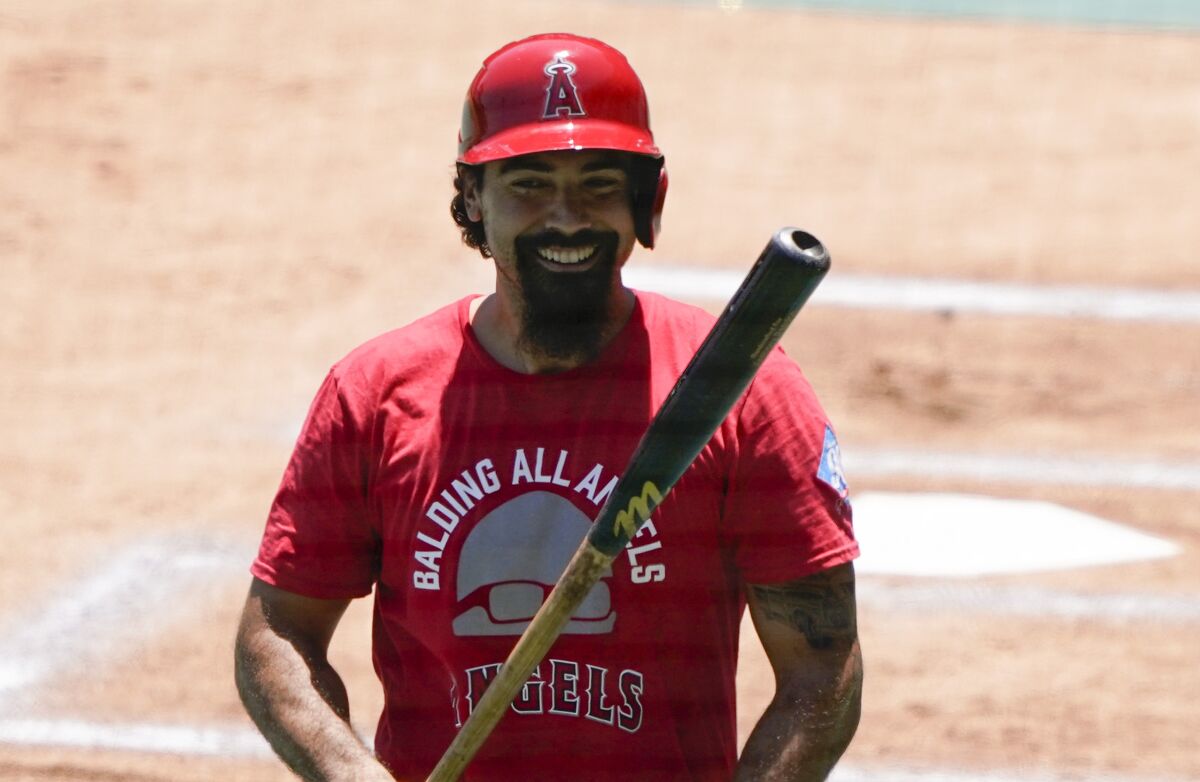 Anthony Rendon smiles after batting during practice July 3 at Angel Stadium.