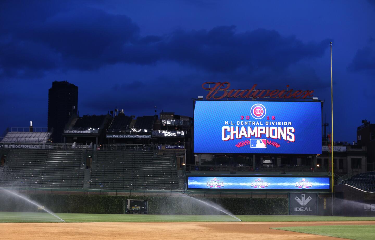 After all the Cubs' celebrations, the scoreboard still reads "2016 N.L. Central Division Champions" at Wrigley Field on Friday, Sept. 16, 2016.
