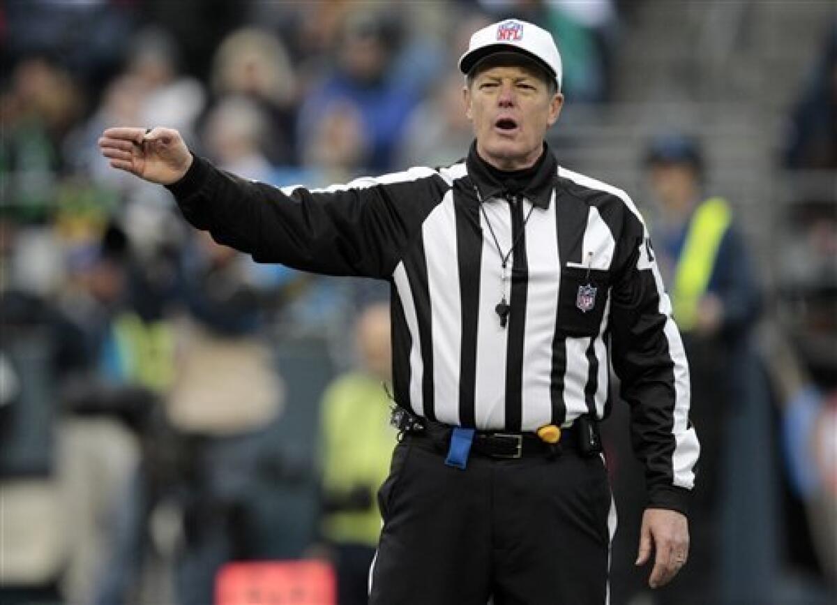 Ed Hochuli Negotiates with the Big Boys