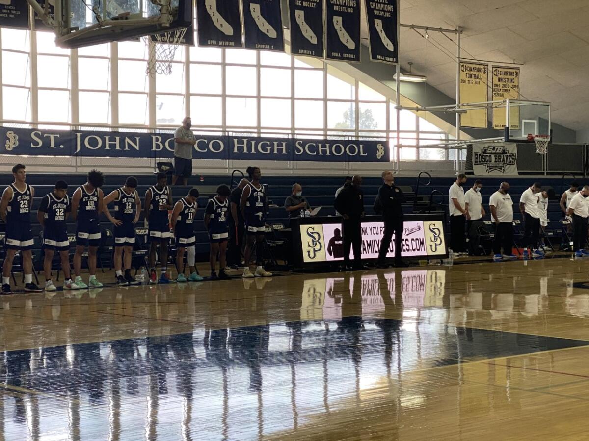 St. John Bosco and Windward players finally opened the basketball season on Tuesday at St. John Bosco. The Braves won 58-41.