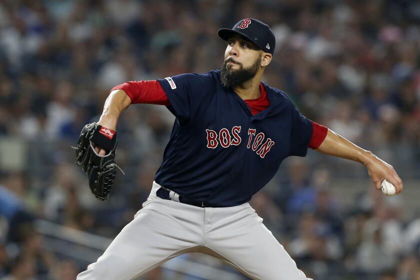 NEW YORK, NEW YORK - AUGUST 04: David Price #10 of the Boston Red Sox pitches during the first inning against the New York Yankees at Yankee Stadium on August 04, 2019 in New York City. (Photo by Jim McIsaac/Getty Images)