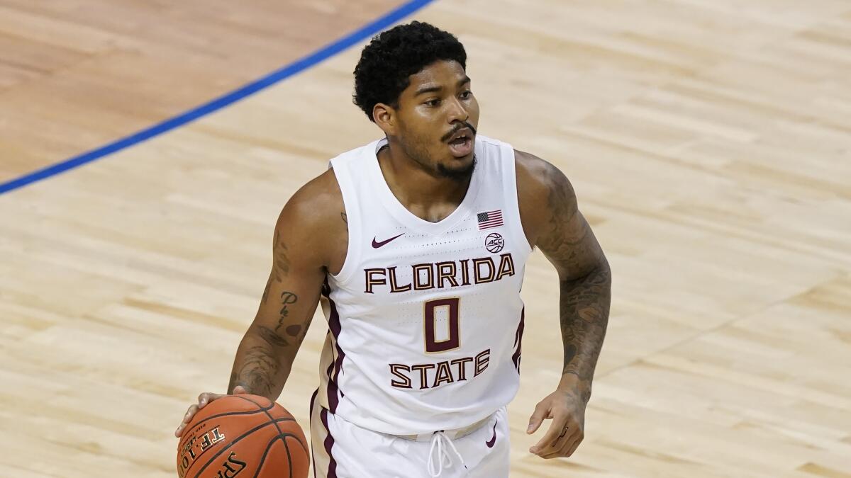 Florida State guard RayQuan Evans drives against North Carolina in the Atlantic Coast Conference tournament.