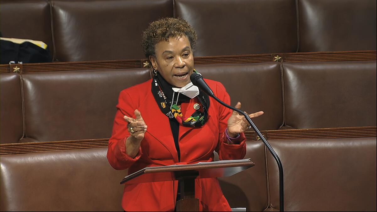 Rep. Barbara Lee speaks on the floor of the House of Representatives in 2020.