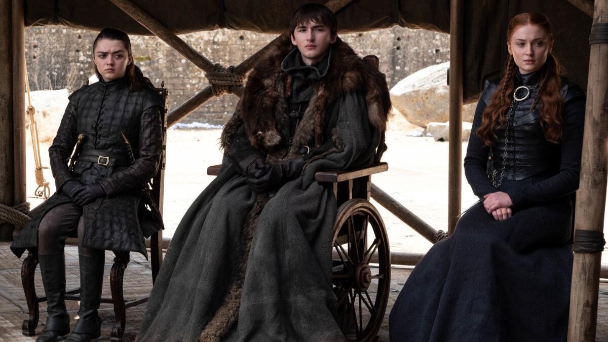 Maisie Williams, left, Isaac Hempstead Wright and Sophie Turner in the final episode of "Game of Thrones."