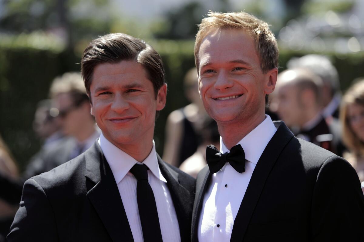 David Burtka, left, and Neil Patrick Harris married in Italy over the weekend. Above, the couple at the Creative Arts Emmy Awards in 2010.