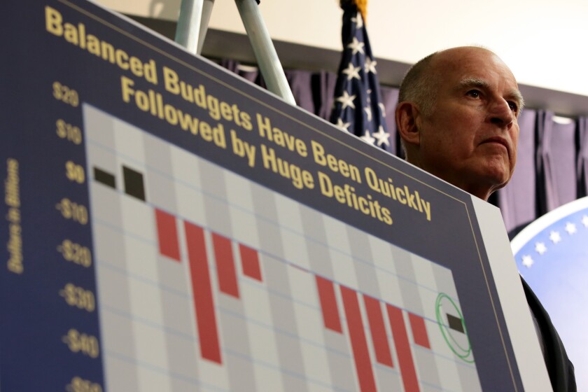 California Gov. Jerry Brown announces his proposed budget at a downtown Los Angeles news conference.