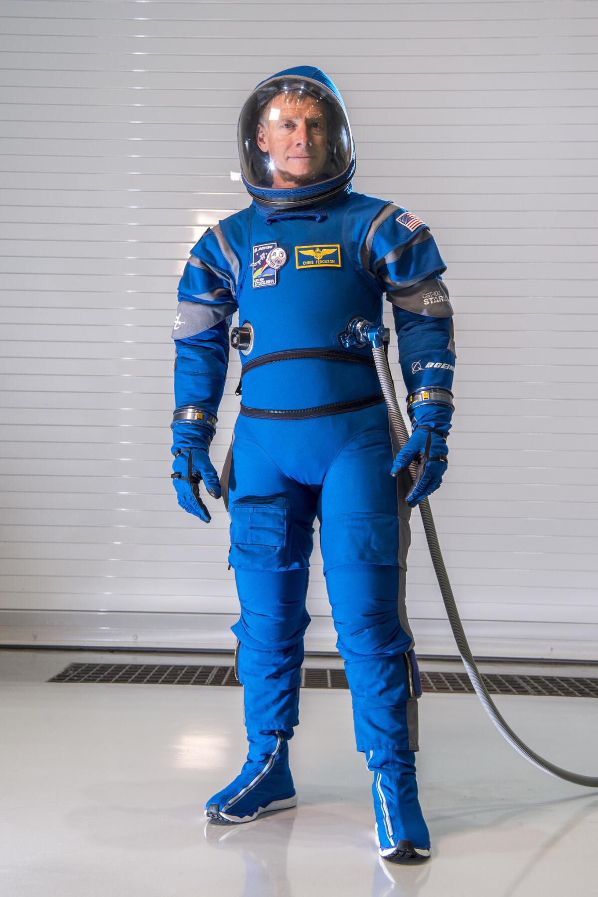Chris Ferguson, a former NASA astronaut and current Boeing director of Starliner crew and mission systems, wears the Boeing spacesuit. (Boeing)