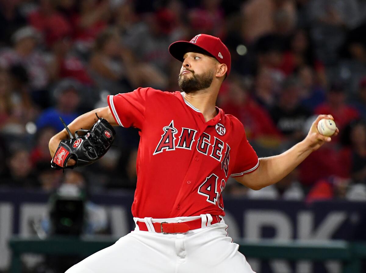 Angels pitcher Patrick Sandoval pitches in the third inning against the Texas Rangers at Angel Stadium on Wednesday.