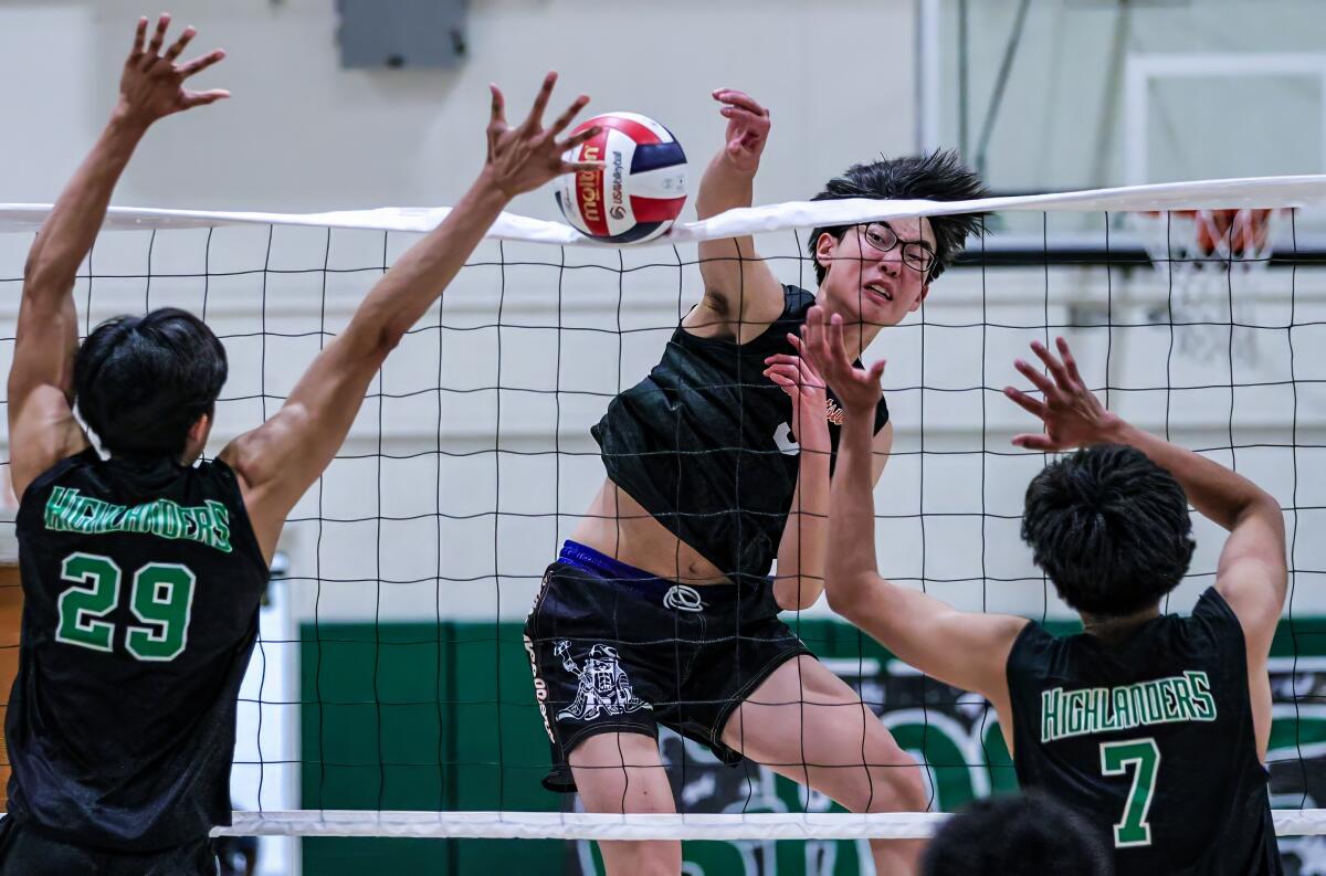 Grant Chang of Chatsworth delivers a kill against Granada Hills. He learned he was accepted to MIT.