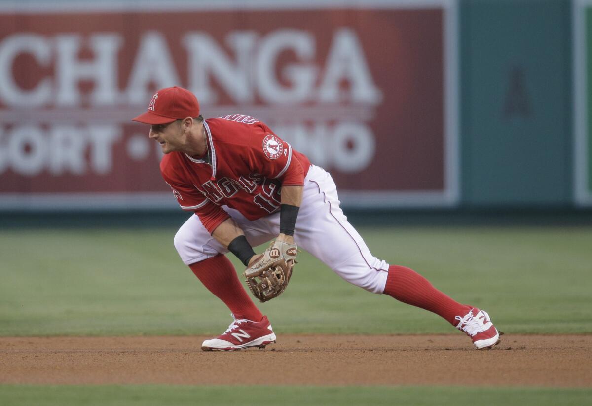 Angels second baseman Johnny Giavotella fields a ground ball during the first inning against the White Sox.