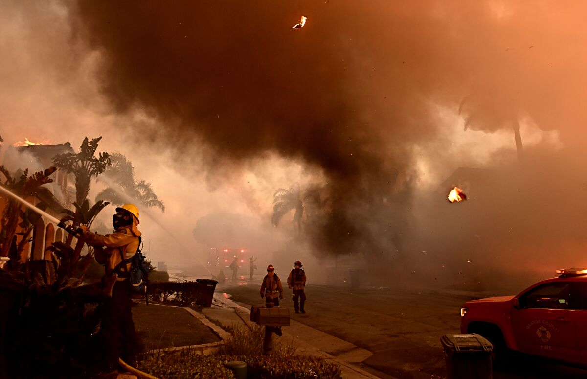 Firefighters in a smoky neighborhood