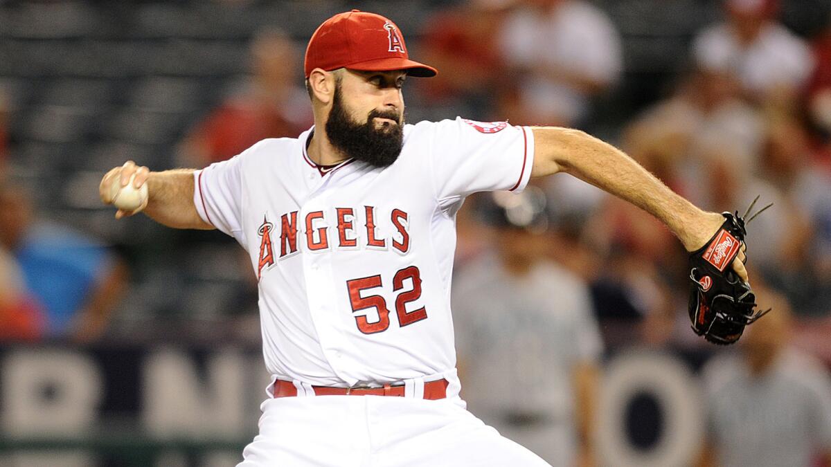 Angels starter Matt Shoemaker delivers a pitch during Monday's game against the Seattle Mariners.