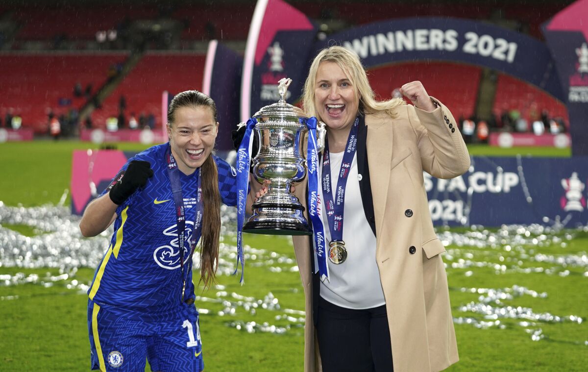 Chelsea's Fran Kirby and manager Emma Hayes celebrate with the trophy after winning the women's FA Cup 