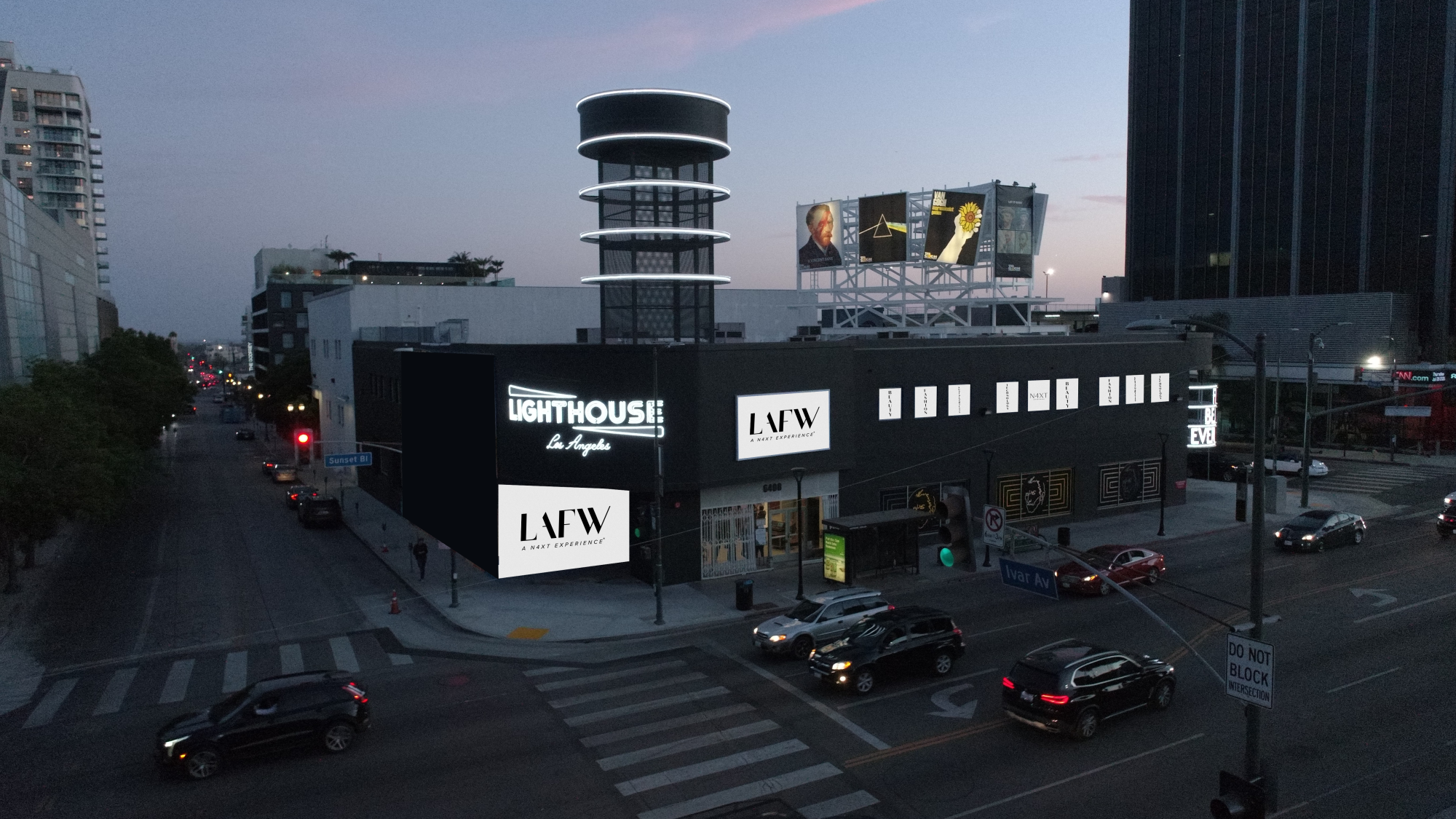 Exterior view of a black corner building branded with LAFW imagery