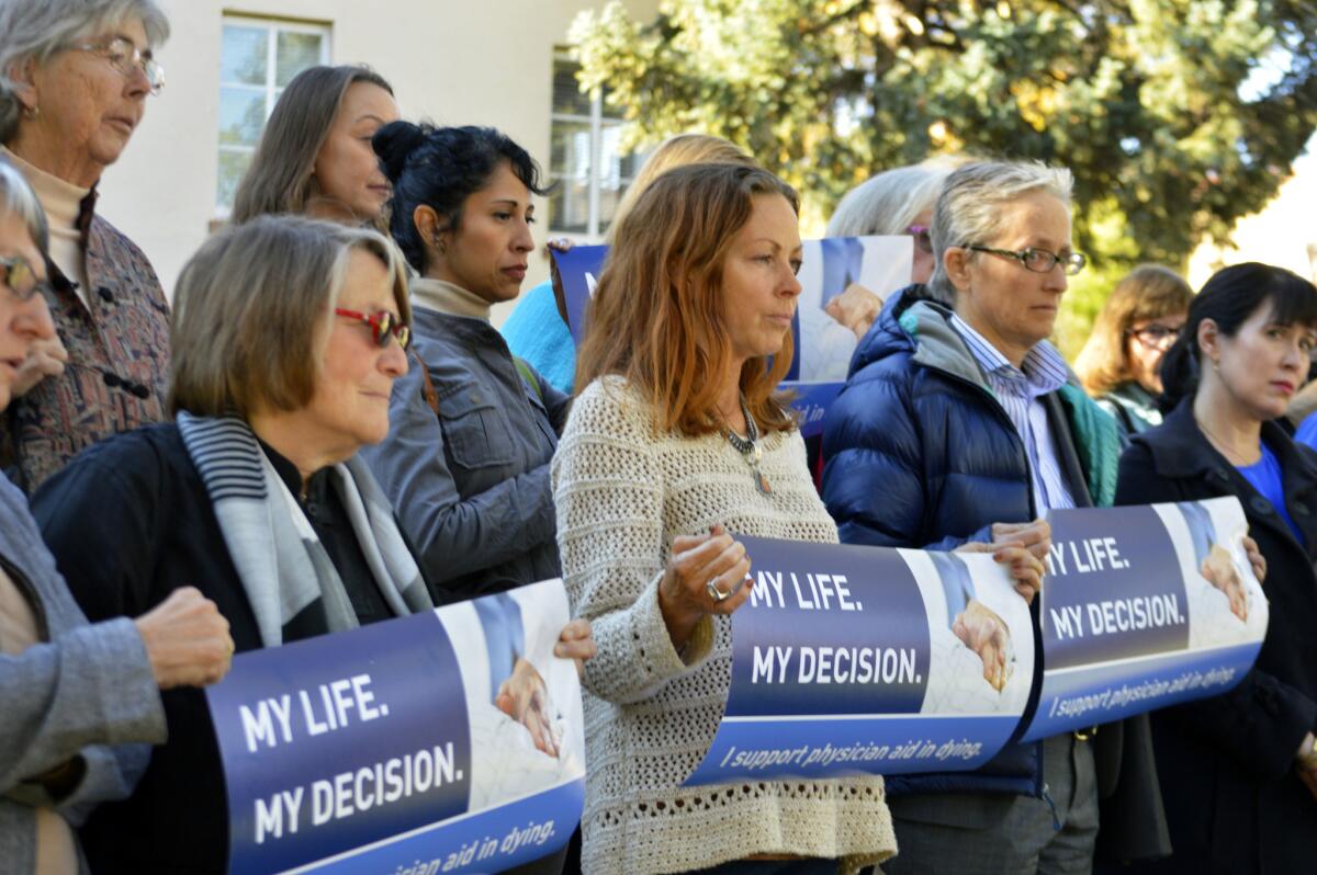 Right-to-die advocates rally in Santa Fe, N.M., in 2015. California's assisted suicide law took effect June 9.