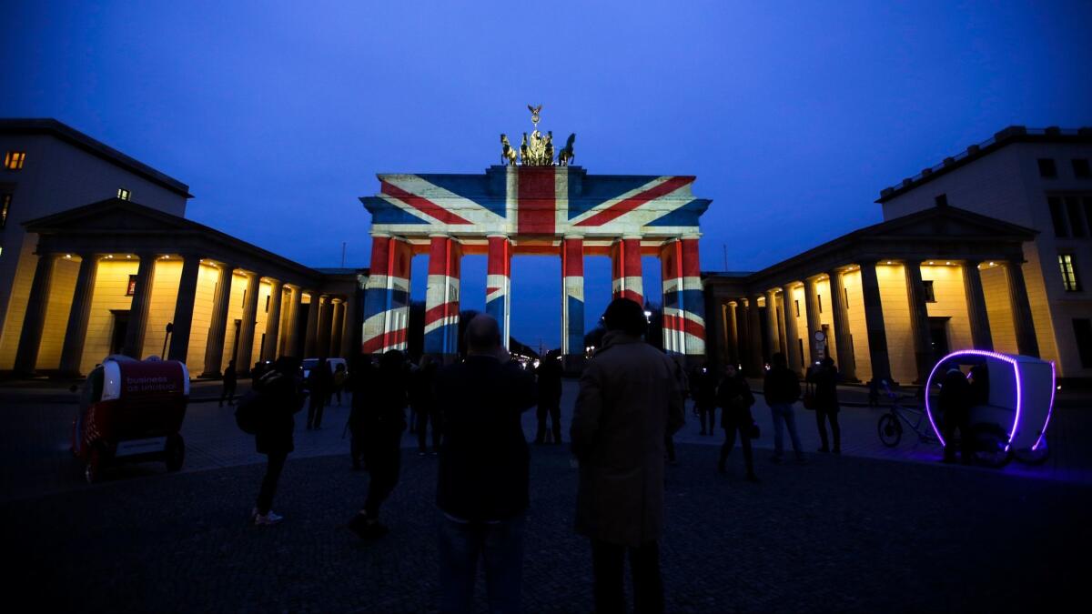 The Brandenburg Gate in Berlin is illuminated with the colors of the British flag to pay tribute to the victims of the terrorist attack in London.