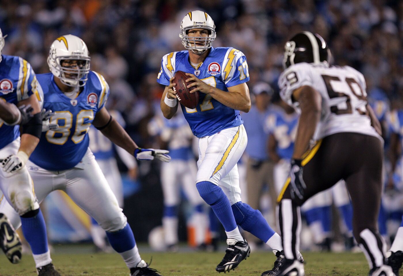 Charger's Philip Rivers drops back to pass in the 2nd quarter against the Broncos on Oct. 19, 2009.