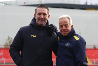 Former Galaxy star Robbie Keane, left, and former U.S. men's national team assistant Dave Sarachan.