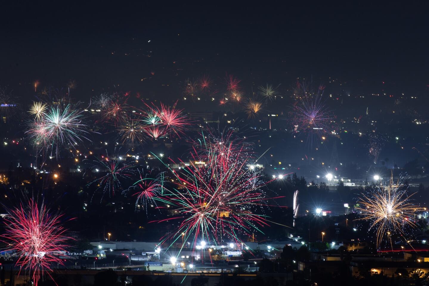 Fireworks over North Hollywood, as seen from the Burbank Hills on July Fourth.