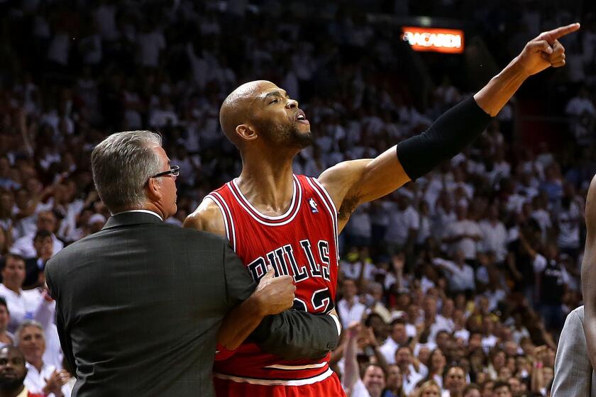 Chicago Bulls forward Taj Gibson continues to yell at the referees after he was ejected in Game 2 of a playoff series against the Miami Heat.