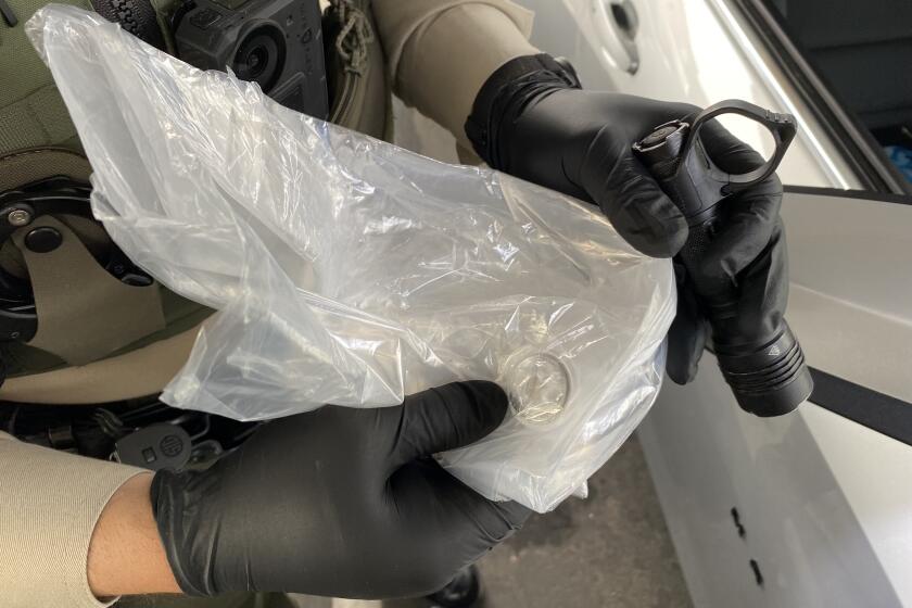 Santa Barbara County Sheriff's Deputies were led to two suspected mail thieves after a woman mailed herself an Apple AirTag, a personal tracking device that led authorities to her stolen mail. ( Santa Barbara County Sheriff's Dept.)