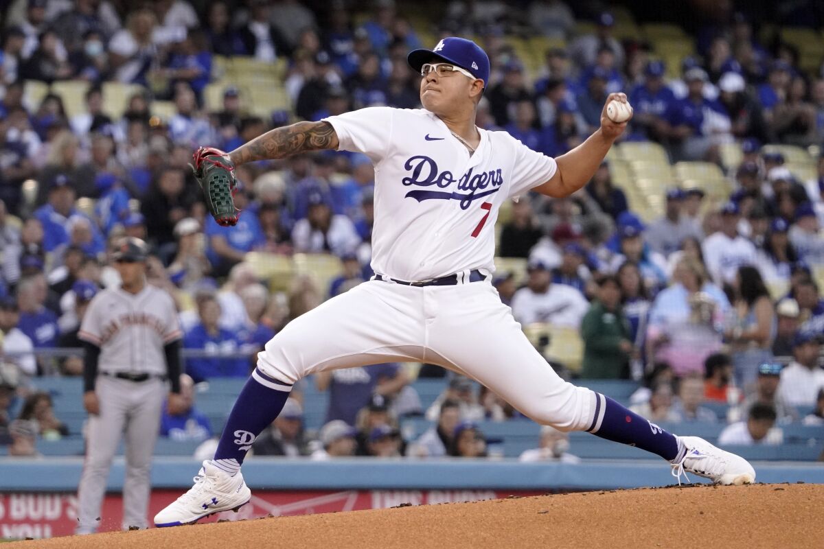 Dodgers pitcher Julio Urías throws to the plate during the first inning against the San Francisco Giants.