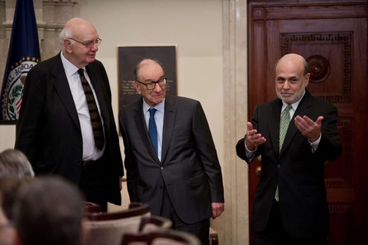 Federal Reserve Chairman Ben S. Bernanke, right, attends a Fed centennial ceremony Monday with former Chairmen Paul Volcker, left, and Alan Greenspan.