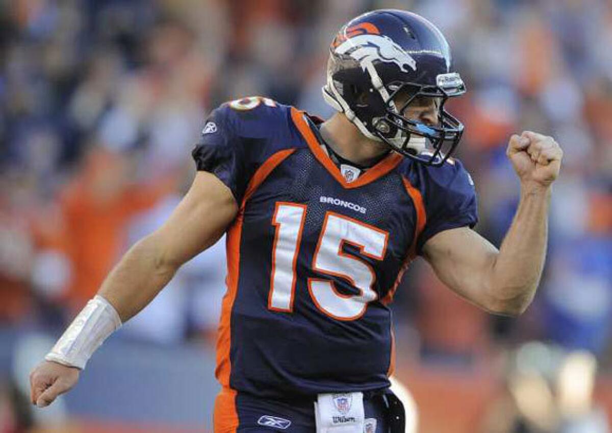 Tim Tebow with the Broncos last season. The St. Louis Rams might still be interested in making a deal for him if he becomes available again.