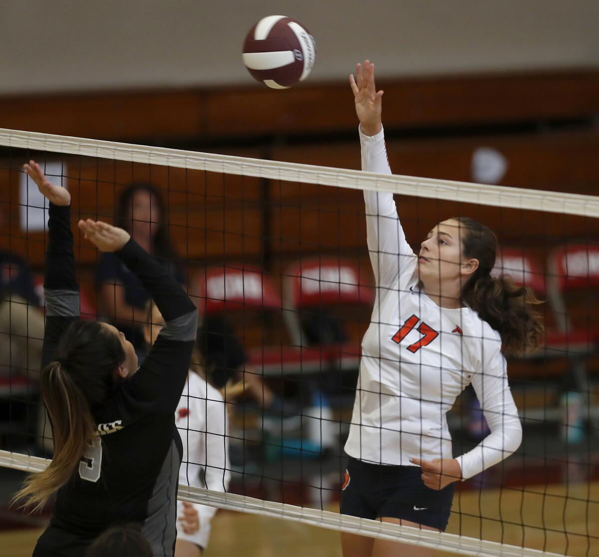 Pacifica Christian Orange County's Rebecca Penjoyan (17) hits against Downey Calvary Chapel.  