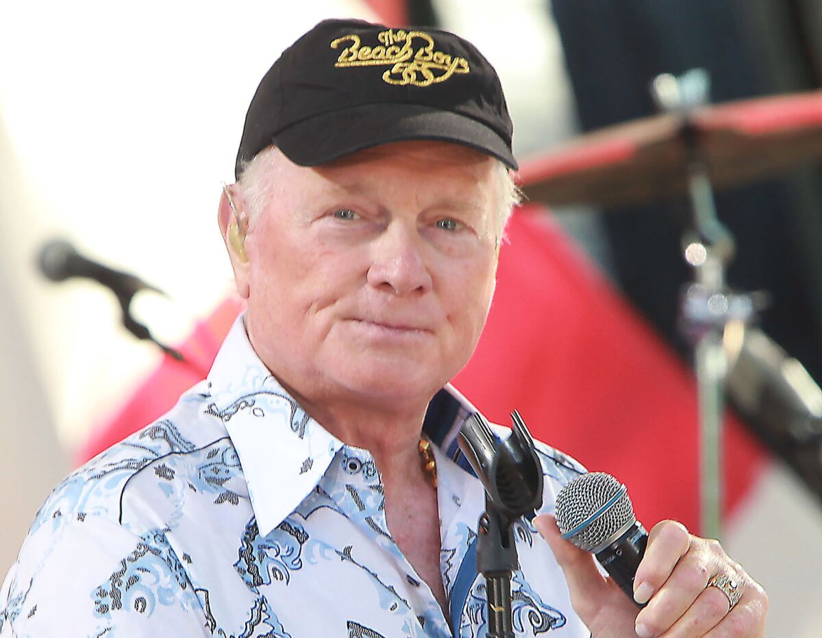 Mike Love of the Beach Boys on stage.