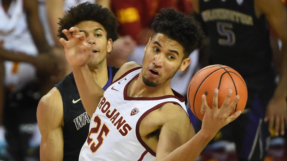 USC's Bennie Boatwright, guarded by Washington's Matisse Thybull on Dec. 29, missed the final nine games last season because of a knee injury.