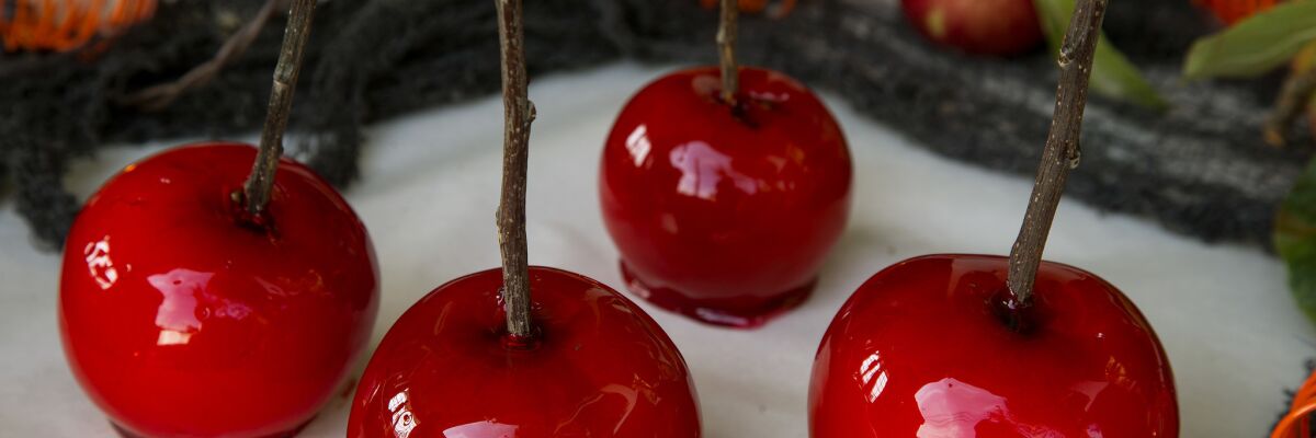 Candy apples with twigs as sticks