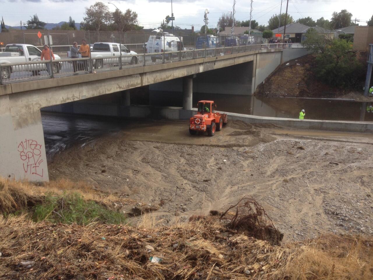Flooding and mud closed the 5 Freeway in both directions in Sunland on Wednesday after a storm caused debris to flow down across all lanes.