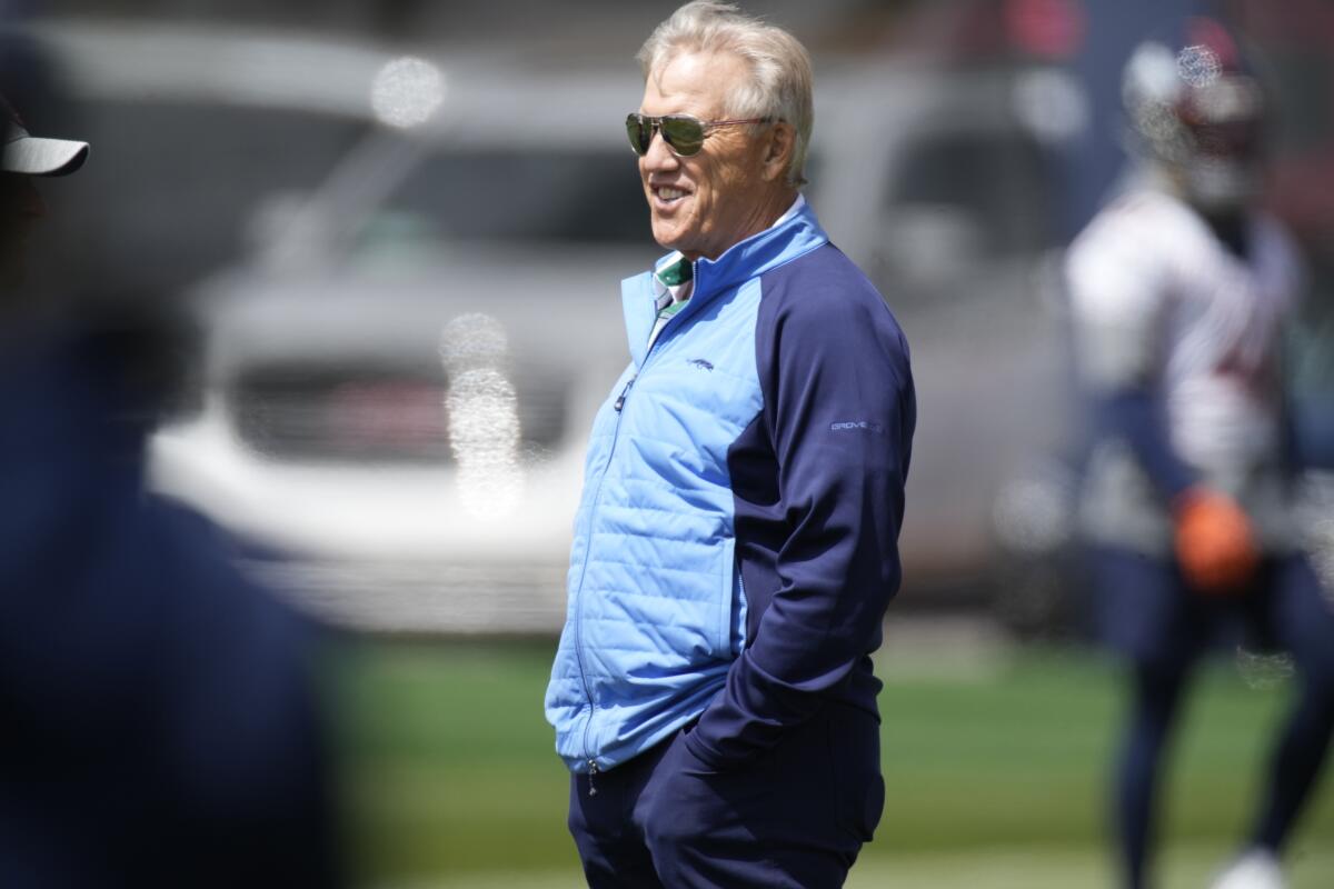 John Elway: Russell Wilson is 'the piece that we needed' - The San Diego  Union-Tribune