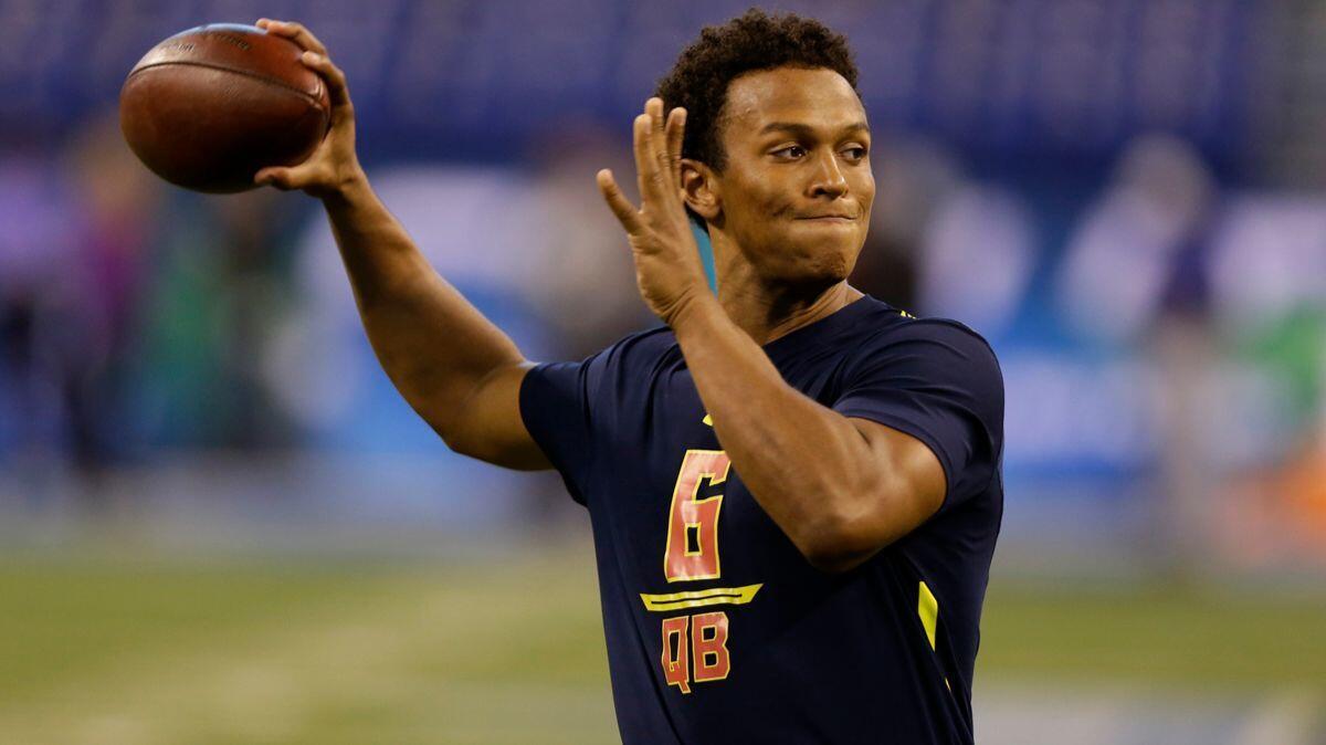 Former Notre Dame quarterback DeShone Kizer cocks his arm to pass at the NFL scouting combine in Indianapolis on March 4.